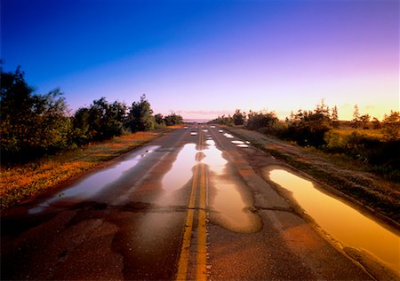 Rain Puddles on Road at Sunset Highway 6, near Cavendish Prince Edward Island, Canada Stock Photo - Rights-Managed, Code: 700-00026319