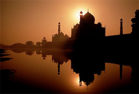 sunrise taj mahal - Silhouette of Taj Mahal at Sunset Agra, India Stock Photo - Rights-Managed, Code: 700-00026385