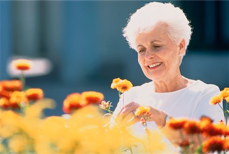 smelling old people - Mature Woman in Garden Stock Photo - Rights-Managed, Code: 700-00026639