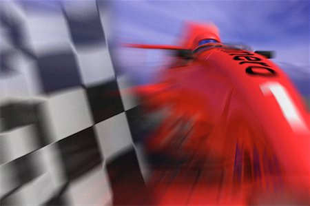 Blurred Close-Up of Formula Race Car and Checkered Flag Stock Photo - Rights-Managed, Code: 700-00027007