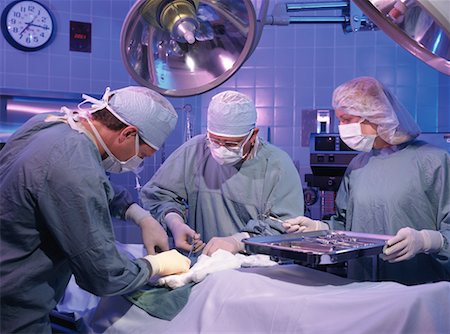 simsearch:673-02141022,k - Surgeons Operating on Patient Stock Photo - Rights-Managed, Code: 700-00027087