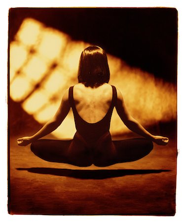 Back View of Woman Sitting in Lotus Position, Floating Stock Photo - Rights-Managed, Code: 700-00027170