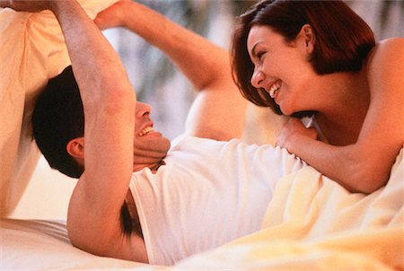 Couple Lying in Bed Stock Photo - Rights-Managed, Code: 700-00027214