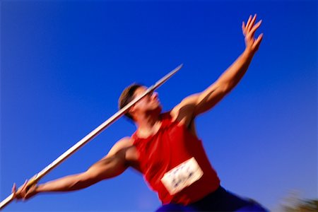 Blurred View of Man Throwing Javelin Foto de stock - Con derechos protegidos, Código: 700-00027236