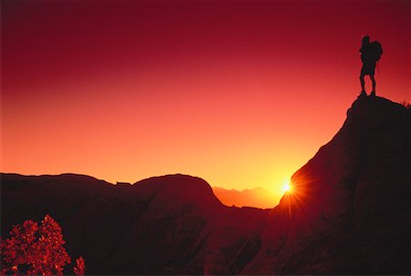simsearch:700-00016274,k - Silhouette du randonneur au coucher du soleil Moab, Utah, Etats-Unis Photographie de stock - Rights-Managed, Code: 700-00027230