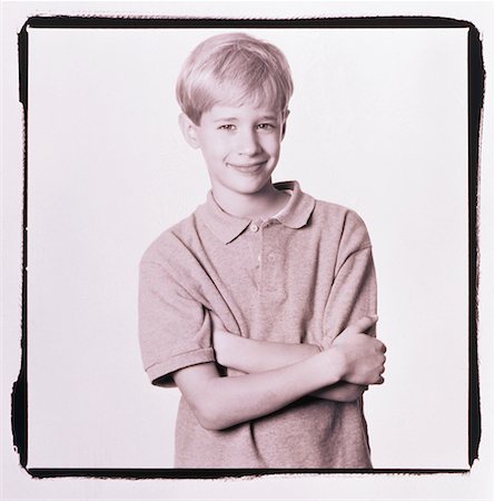 simsearch:700-00045320,k - Portrait of Boy with Arms Crossed Stock Photo - Rights-Managed, Code: 700-00027495