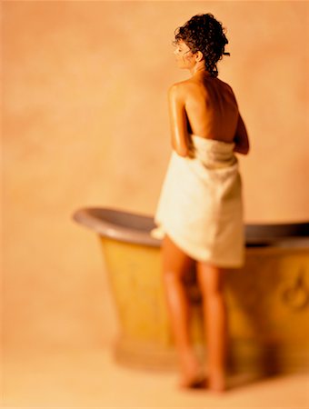 simsearch:700-01694805,k - Woman Standing in Front of Bathtub Stock Photo - Rights-Managed, Code: 700-00027687
