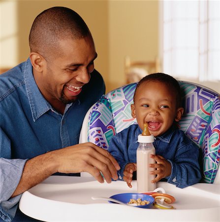 Father with Child in Highchair Stock Photo - Rights-Managed, Code: 700-00027833