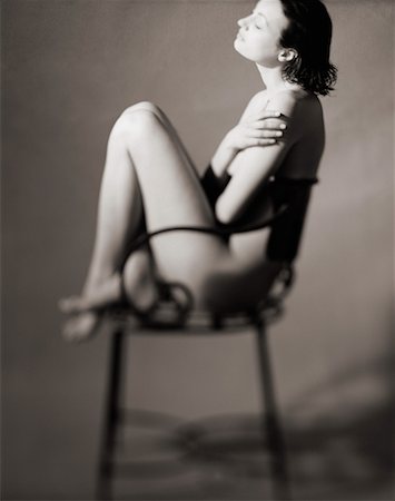simsearch:700-00157355,k - Nude Woman Sitting in Chair Stock Photo - Rights-Managed, Code: 700-00027852