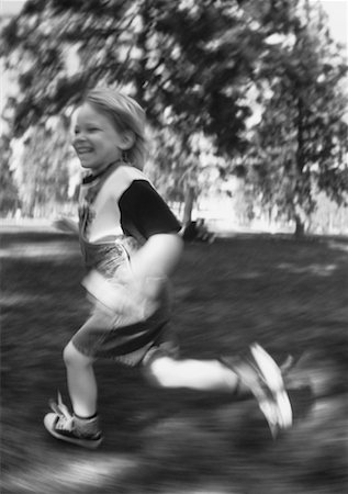 Blurred View of Boy Running Outdoors Stock Photo - Rights-Managed, Code: 700-00028900