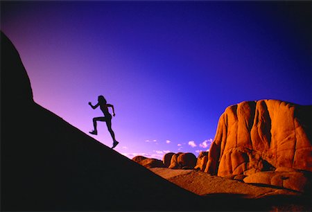 peter griffith - Silhouette of Woman Running Up Hill Stock Photo - Rights-Managed, Code: 700-00029069