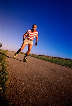 Mature Man In-Line Skating Stock Photo - Rights-Managed, Code: 700-00029818