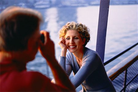 simsearch:614-06719908,k - Homme qui prend la photographie d'une femme Mature sur le Ferry Photographie de stock - Rights-Managed, Code: 700-00029868