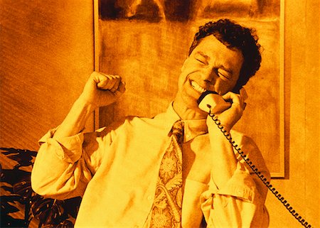 pierre tremblay - Excited Businessman on Telephone Stock Photo - Rights-Managed, Code: 700-00020430