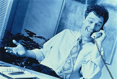 pierre tremblay - Homme d'affaires sur le téléphone, le sourire Photographie de stock - Rights-Managed, Code: 700-00020431