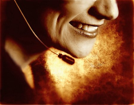 Close-Up of Woman with Telephone Headset Foto de stock - Con derechos protegidos, Código: 700-00020866