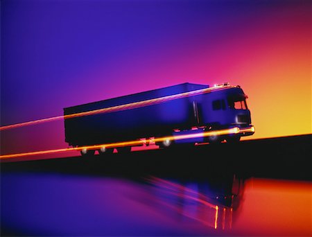 Transport Truck with Light Trails At Sunset Stock Photo - Rights-Managed, Code: 700-00021231