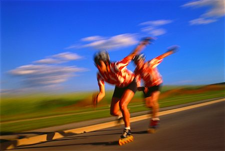 Blurred View of Men In-Line Skating Stock Photo - Rights-Managed, Code: 700-00021808