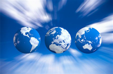 simsearch:700-00042293,k - Three Globes Displaying Continents of the World in Sky Stock Photo - Rights-Managed, Code: 700-00021911