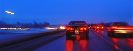 road panoramic blurred - Blurred View of Highway Traffic In Winter at Night Stock Photo - Rights-Managed, Code: 700-00022904