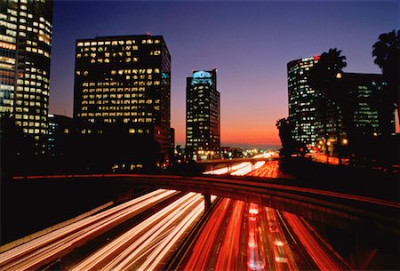 Cityscape and Highway with Light Trails at Night Los Angeles, California, USA Stock Photo - Rights-Managed, Code: 700-00022928
