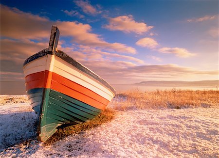 put out to pasture - Boat on Shore in Winter at Dawn Near Cap-Chat, Gaspe, Quebec Canada Stock Photo - Rights-Managed, Code: 700-00023031