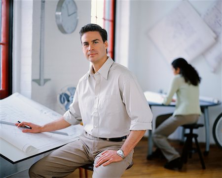 Portrait of Man Sitting at Drafting Table Stock Photo - Rights-Managed, Code: 700-00034464