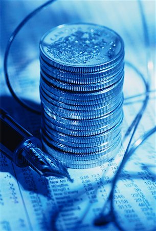 simsearch:600-00056882,k - Stack of Coins and Pen on Financial Pages Stock Photo - Rights-Managed, Code: 700-00034577