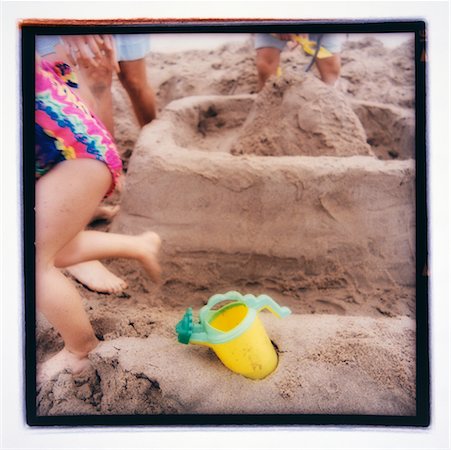 Children in Swimwear, Building Sand Castle on Beach Foto de stock - Con derechos protegidos, Código: 700-00034616