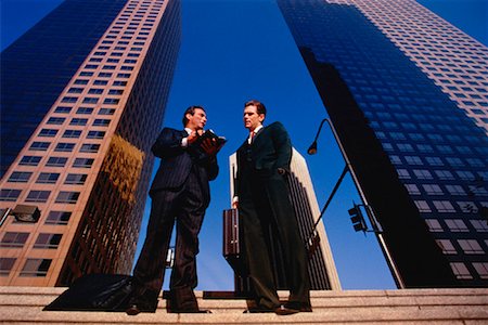 skyscraper company suit - Businessmen Talking Outdoors Stock Photo - Rights-Managed, Code: 700-00034678
