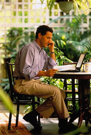 small business phone outside - Man Using Laptop on Patio Singapore Stock Photo - Rights-Managed, Code: 700-00034831