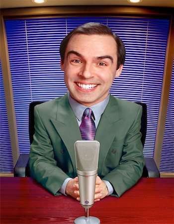 Portrait of Businessman at Desk With Microphone Foto de stock - Con derechos protegidos, Código: 700-00034925