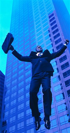 skyscraper company suit - Businessman Jumping Stock Photo - Rights-Managed, Code: 700-00035391