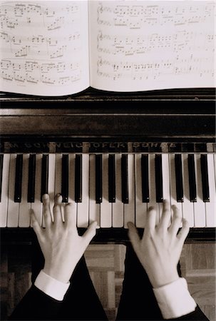 simsearch:700-00035551,k - Overhead View of Hands Playing Piano Stock Photo - Rights-Managed, Code: 700-00035500