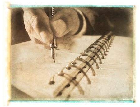 penna stilografica - Close-Up of Hand Writing with Fountain Pen in Coil Notebook Fotografie stock - Rights-Managed, Codice: 700-00035559