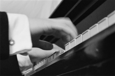 Close-Up of Hands Playing Piano Stock Photo - Rights-Managed, Code: 700-00035551