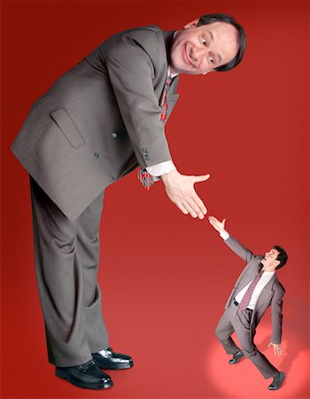 standing tall concept business - Big Businessman Shaking Hands With Small Businessman Stock Photo - Rights-Managed, Code: 700-00035634