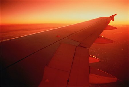 simsearch:700-00197436,k - Affichage de voilure de l'avion au coucher du soleil Photographie de stock - Rights-Managed, Code: 700-00035897