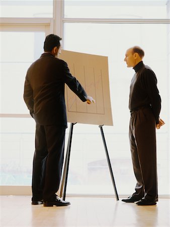 Businessmen Looking at Graph Stock Photo - Rights-Managed, Code: 700-00036234