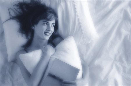 simsearch:700-00062758,k - Woman Lying in Bed, Holding Book Stock Photo - Rights-Managed, Code: 700-00036814