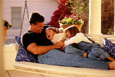 porch swing images - Father with Children Sitting Outdoors Foto de stock - Con derechos protegidos, Código: 700-00036882