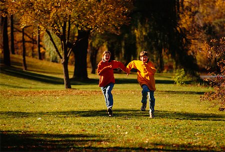 family with teenagers city park - Children Running Through Park In Autumn Stock Photo - Rights-Managed, Code: 700-00036981