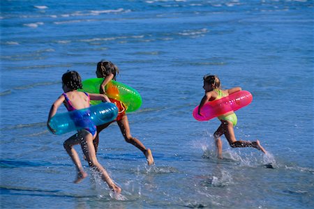 Girls in Swimwear, Running on Beach with Swimwear Stock Photo - Rights-Managed, Code: 700-00037021
