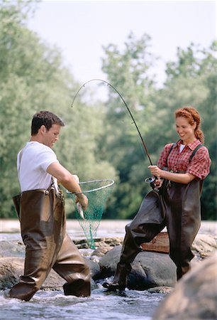 Women fishing in hip waders Stock Photos - Page 1 : Masterfile