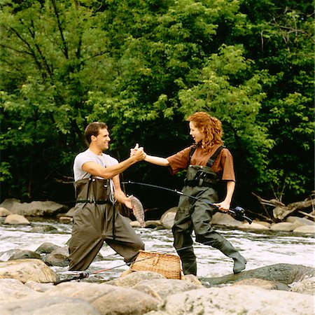 females in hip waders - Couple Fishing Ontario, Canada Stock Photo - Rights-Managed, Code: 700-00037090