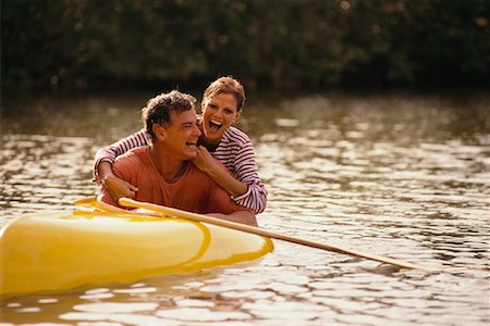 Couple and Overturned Canoe Stock Photo - Rights-Managed, Code: 700-00037116