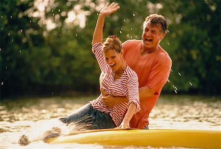 Couple and Overturned Canoe Stock Photo - Rights-Managed, Code: 700-00037118