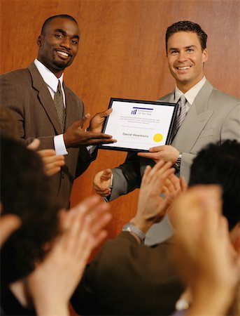 Businessman Accepting Award Stock Photo - Rights-Managed, Code: 700-00037209