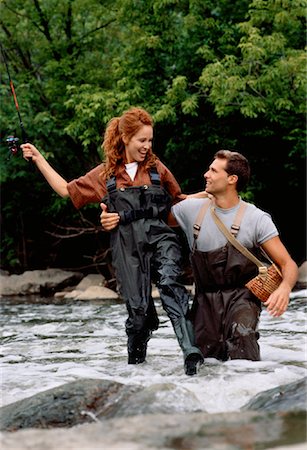 Women fishing in hip waders Stock Photos - Page 1 : Masterfile