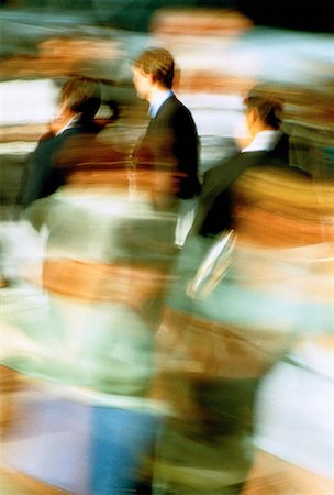 simsearch:700-00088263,k - Blurred View of Businessman Walking on Busy Street Stock Photo - Rights-Managed, Code: 700-00037357